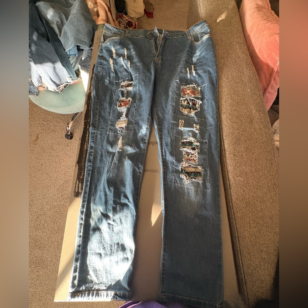 Distressed Blue Jeans with Patterned Patches